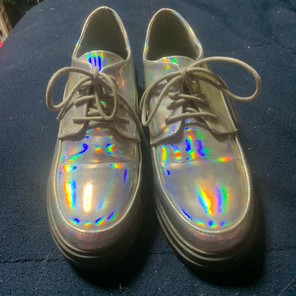 holographic Mary Jane’s platformed